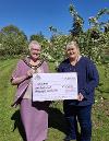 Chairman Cllr Barber cheque presentation to Damsons